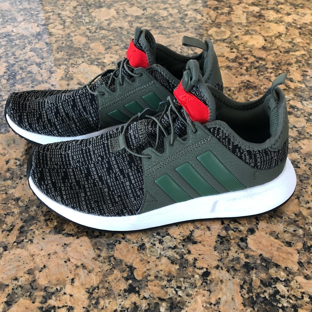 Adidas green slip on sneakers